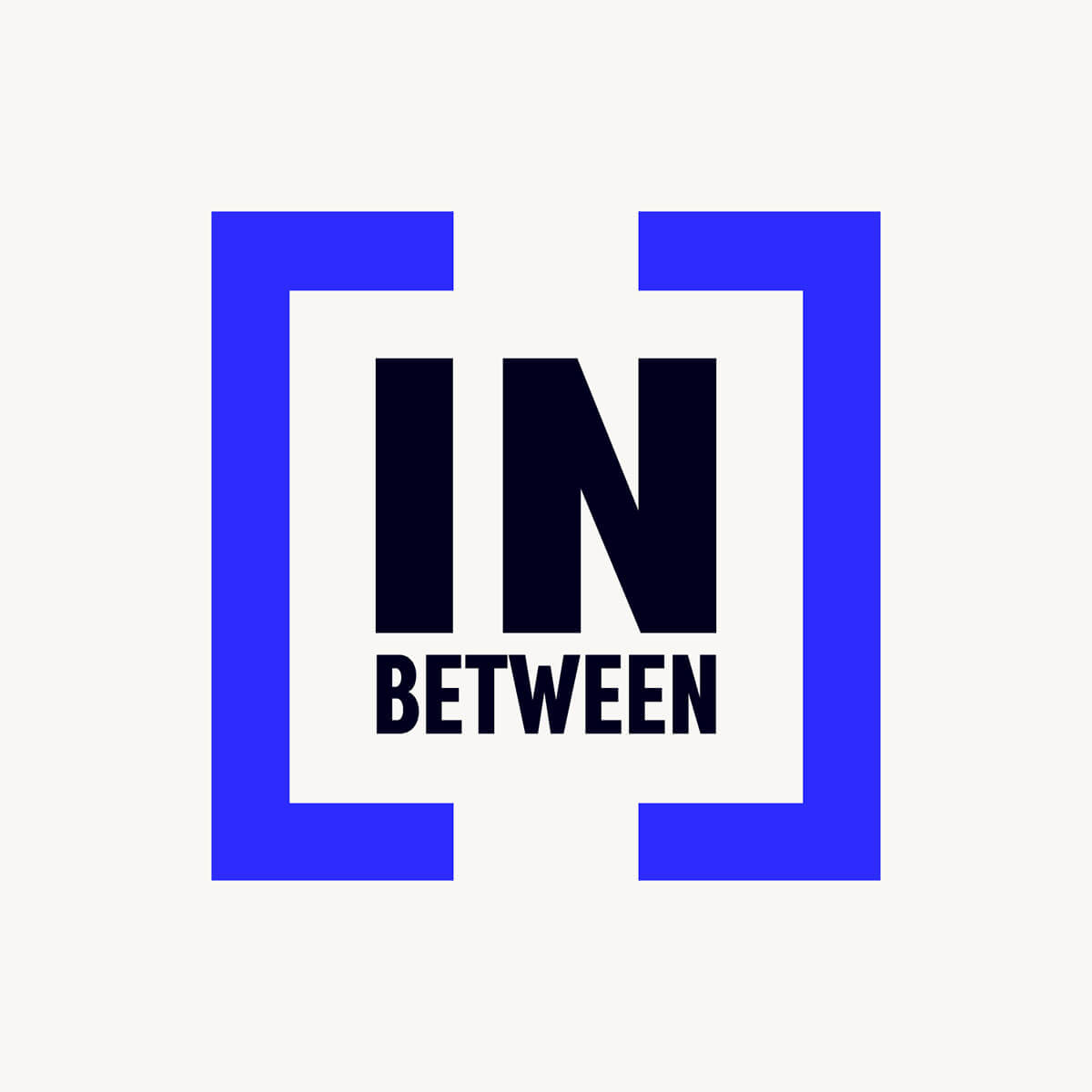 In Between logo design exploration with framed identity treatment